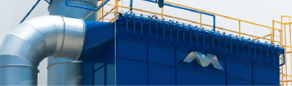 Colector de polvo industrial MCAT con ductería y sistema de limpieza automática