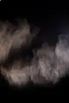 Partículas de polvo en suspensión en el aire industrial